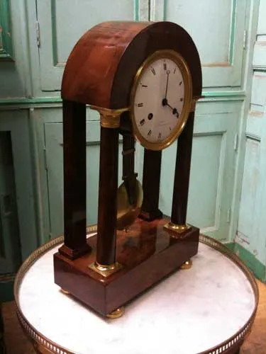 Après restauration. Pendule Charles X Après restauration. Restauration à Paris - Vincennes d'une pendule Charles X